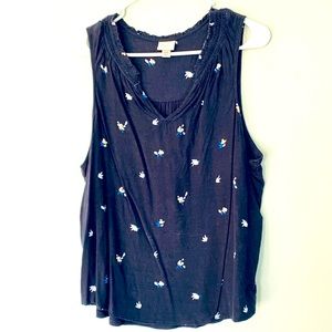 Sleeveless navy floral shirt